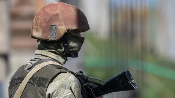 Un militar ruso  - Sputnik Mundo