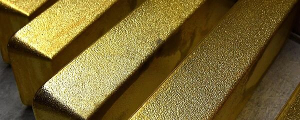 Lingotes de oro, imagen referencial Lingotes de oro, imagen referencial - Sputnik Mundo