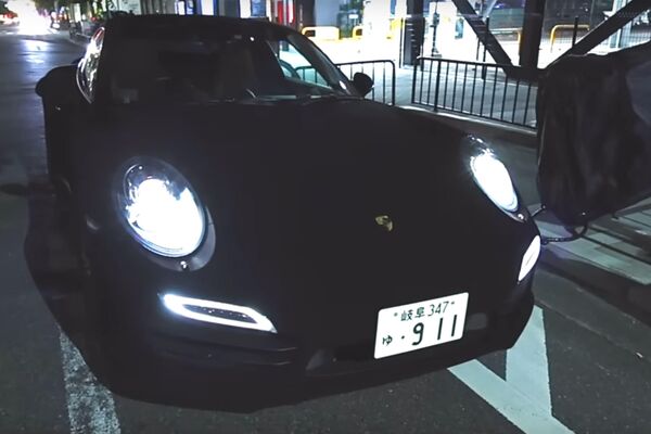 Un Porsche 911 pintado on Musou Black - Sputnik Mundo