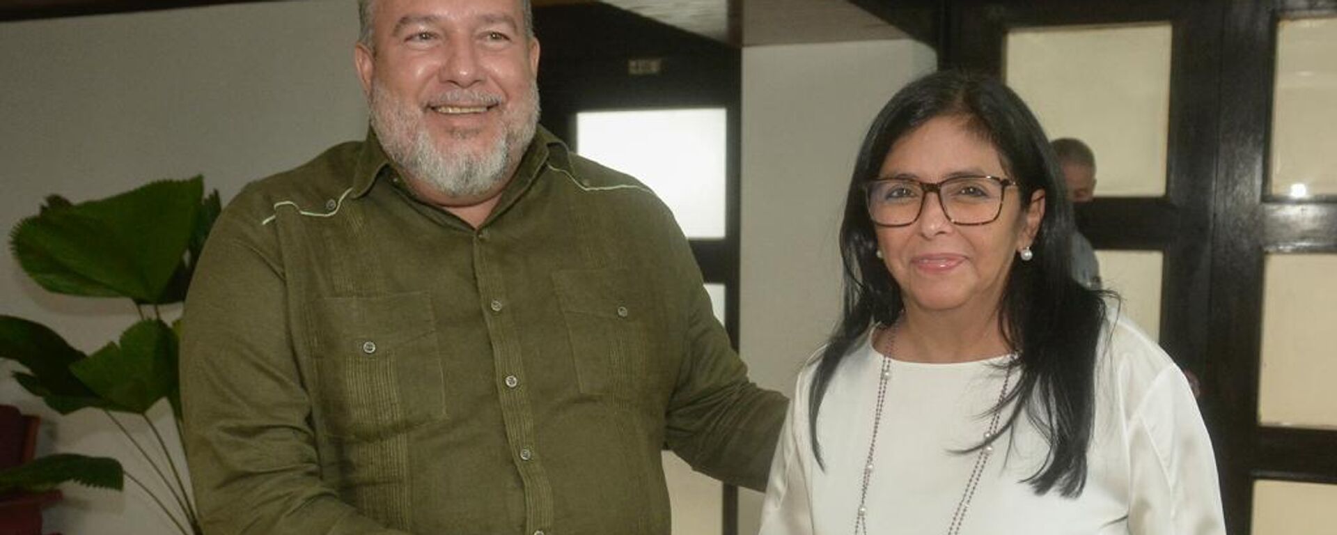 Manuel Marrero Cruz, el primer ministro de Cuba junto a Delcy Rodríguez Gómez, la vicepresidenta ejecutiva de Venezuela en el Palacio de la Revolución, en la Habana - Sputnik Mundo, 1920, 16.07.2022