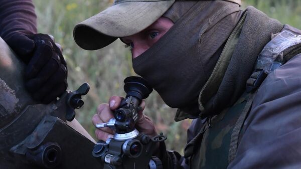 Un militar ruso en Ucrania - Sputnik Mundo