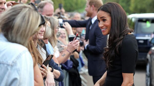 La duquesa de Sussex, Meghan Markle, en el castillo de Windsor para rendir homenaje a la difunta Isabel II - Sputnik Mundo