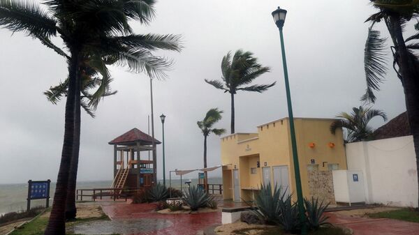 Una tormenta tropical en México - Sputnik Mundo