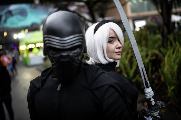 Participantes en un evento de disfraces para promover la cultura del ocio en Bogotá, Colombia. - Sputnik Mundo