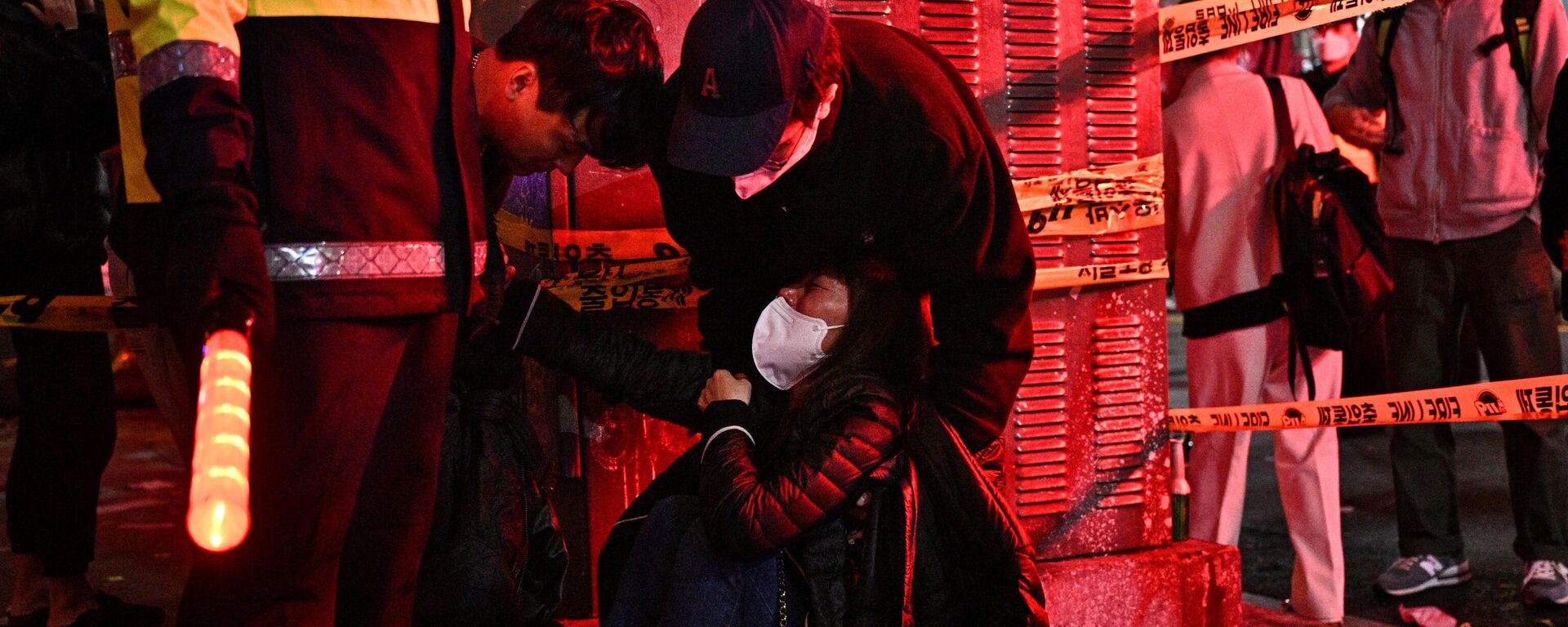 La estampida durante un festejo de Halloween en Seúl, Corea del Sur - Sputnik Mundo, 1920, 30.10.2022