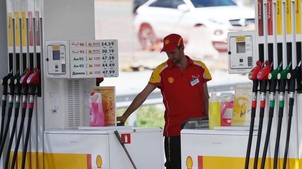 Empleado de gasolinera Shell (referencial) - Sputnik Mundo