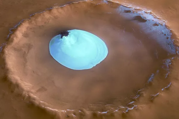 Las temperaturas en Marte descienden en invierno, alcanzando los 123 grados centígrados bajo cero en los polos.En la foto: un cráter sin nombre en la llanura Vastitas Borealis de Marte. La imagen fue tomada por la estación interplanetaria automática Mars Express de la Agencia Espacial Europea. Las temperaturas en Marte descienden en invierno, alcanzando los 123 grados centígrados bajo cero en los polos.En la foto: un cráter sin nombre en la llanura Vastitas Borealis de Marte. La imagen fue tomada por la estación interplanetaria automática Mars Express de la Agencia Espacial Europea. - Sputnik Mundo