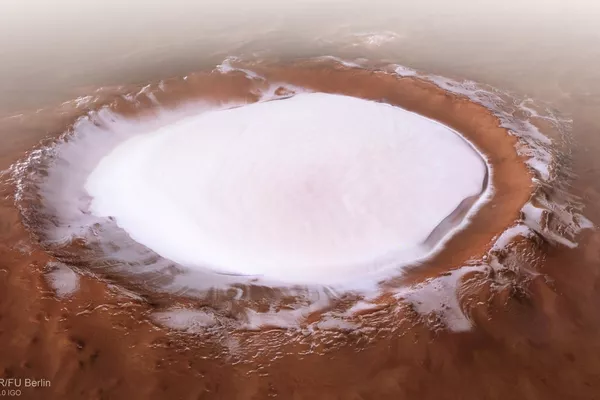 El cráter Korolev, lleno de hielo, en la llanura Vastitas Borealis de Marte. La imagen fue tomada por la estación interplanetaria automática Mars Express de la Agencia Espacial Europea. El cráter Korolev, lleno de hielo, en la llanura Vastitas Borealis de Marte. La imagen fue tomada por la estación interplanetaria automática Mars Express de la Agencia Espacial Europea. - Sputnik Mundo