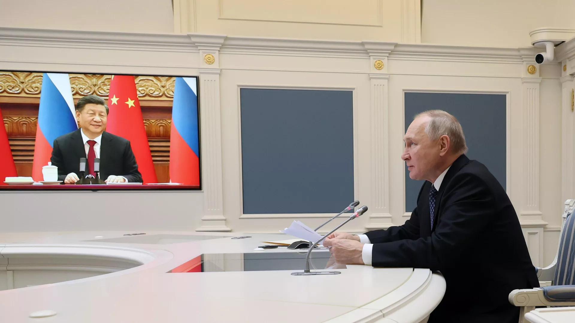 Xi Jinping, presidente de China, y Vladímir Putin, presidente de Rusia, durante una videoconferencia Xi Jinping, presidente de China, y Vladímir Putin, presidente de Rusia, durante una videoconferencia - Sputnik Mundo, 1920, 31.12.2022