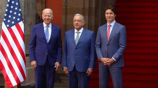 Joe Biden, presidente de EEUU, Andrés Manuel López Obrador, presidente de México, Justean Trudeau, primer ministro de Canadá - Sputnik Mundo