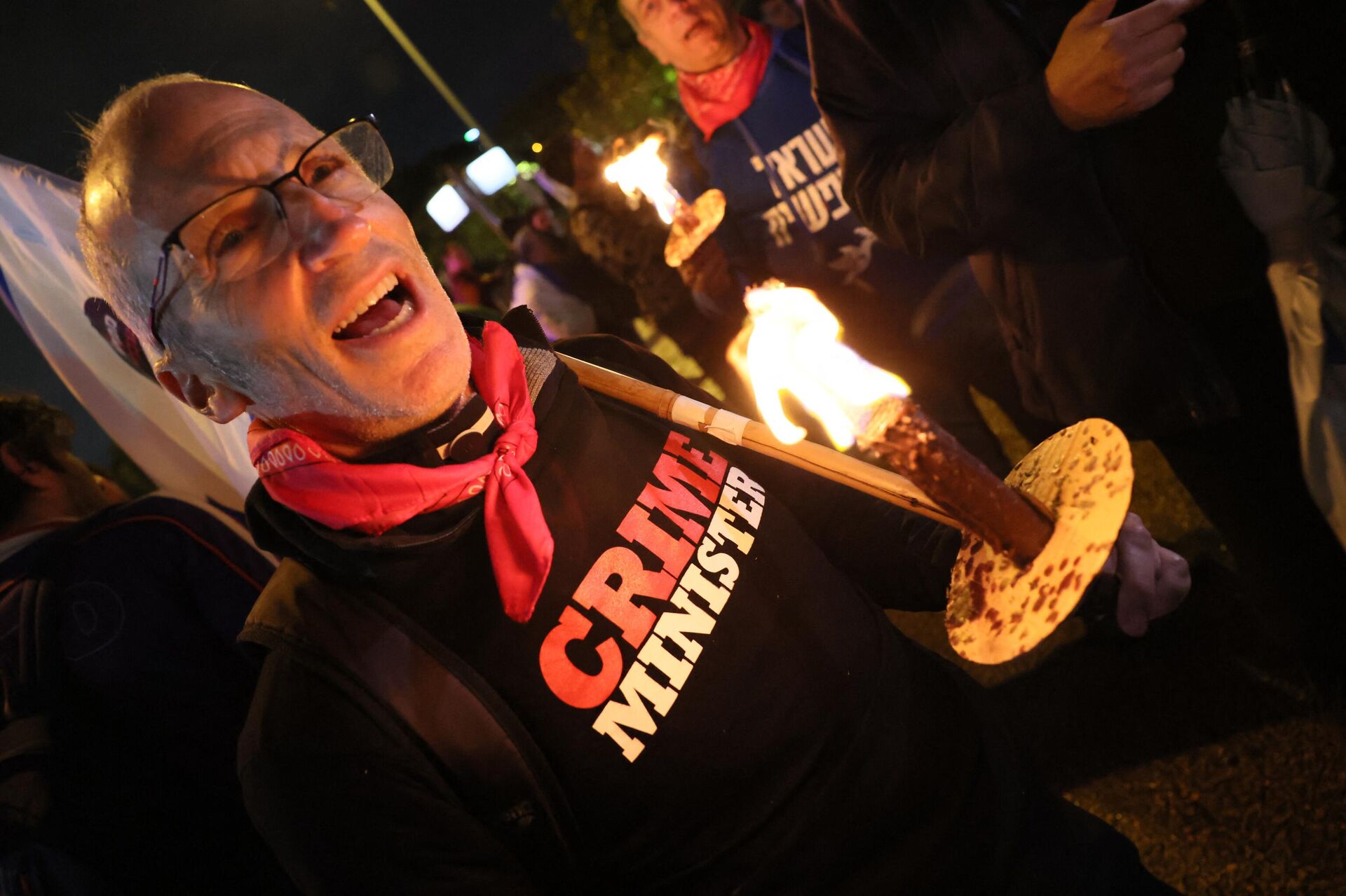 Un manifestante israelí durante las protestas contra Benjamín Netanyahu del 14 de enero de 2023 - Sputnik Mundo, 1920, 14.01.2023