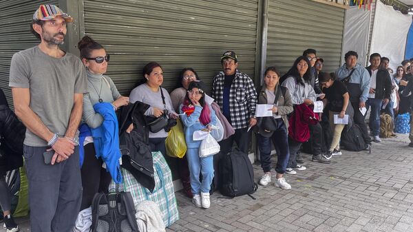 Unos turistas en Machu Picchu - Sputnik Mundo