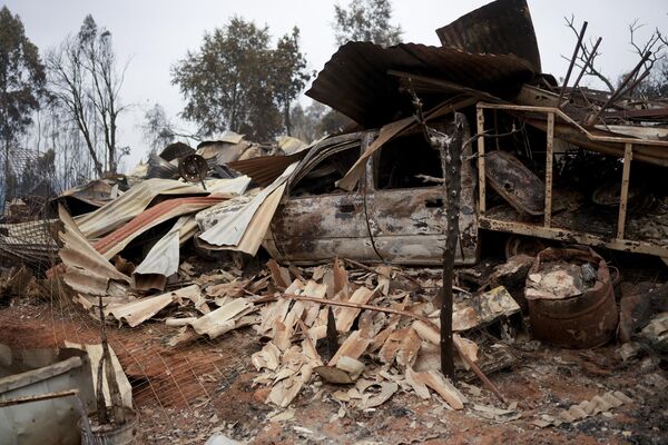 La semana pasada más zonas del país se vieron afectadas por los incendios que la media del año.En la foto: un hogar destruido por el fuego en la ciudad de Tome. La semana pasada más zonas del país se vieron afectadas por los incendios que la media del año.En la foto: un hogar destruido por el fuego en la ciudad de Tome. - Sputnik Mundo