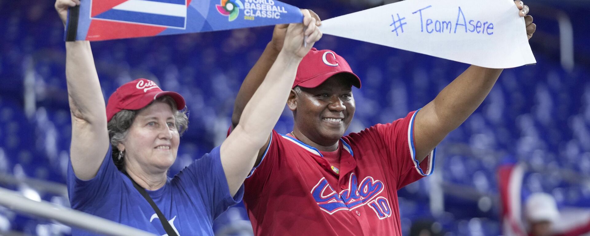 Asistentes al juego entre EEUU y Cuba, por seminifales del Clásico Mundial de Béisbol 2023 Asistentes al juego entre EEUU y Cuba, por seminifales del Clásico Mundial de Béisbol 2023 - Sputnik Mundo, 1920, 21.03.2023
