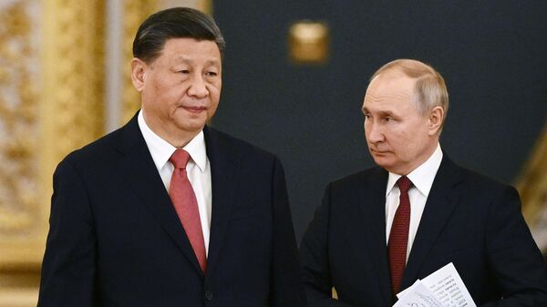 El presidente de China, Xi Jinping, y el presidente de Rusia, Vladímir Putin - Sputnik Mundo