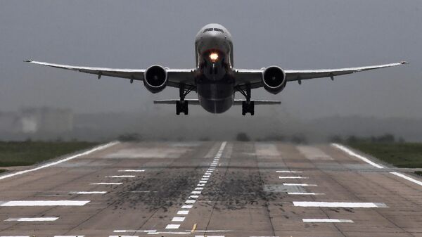 Un avión Boeing 777-300 ER - Sputnik Mundo