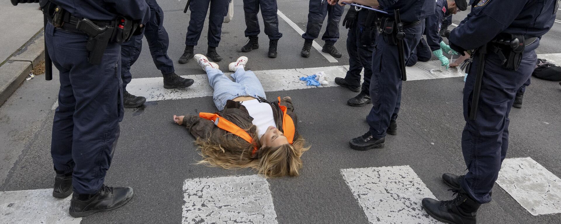 Activistas ambientales austriacos del movimiento Letzte Generation (Última Generación) - Sputnik Mundo, 1920, 15.05.2023