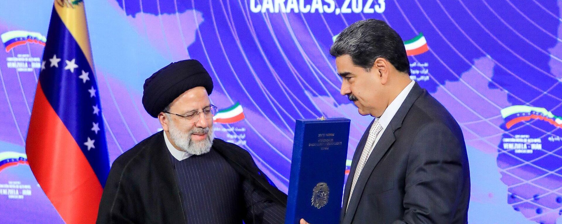 El presidente de Irán, Ebrahim Raisi, y su homólogo de Venezuela, Nicolás Maduro - Sputnik Mundo, 1920, 13.06.2023