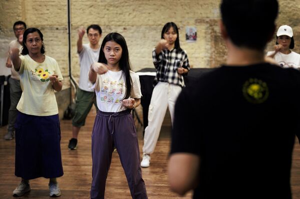 Admiradores de Bruce Lee durante un seminario de artes marciales. - Sputnik Mundo