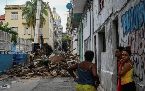 El edificio colapsado estaba situado en una popular zona turística conocida por sus edificios de estilo colonial. Muchos de ellos llevaban más de un siglo sin reparación. - Sputnik Mundo