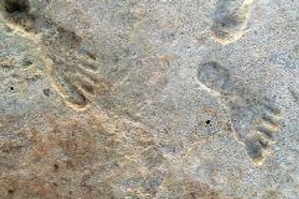 Huellas humanas en el horizonte de la pista, Nuevo México, EEUU - Sputnik Mundo