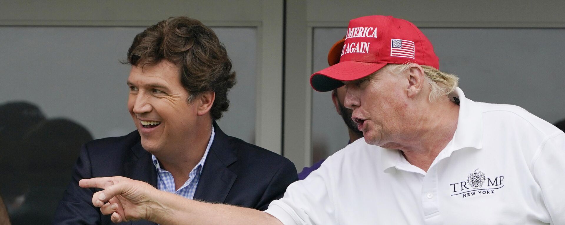 El comentarista político Tucker Carlson y el expresidente estadounidense Donald Trump - Sputnik Mundo, 1920, 13.12.2023