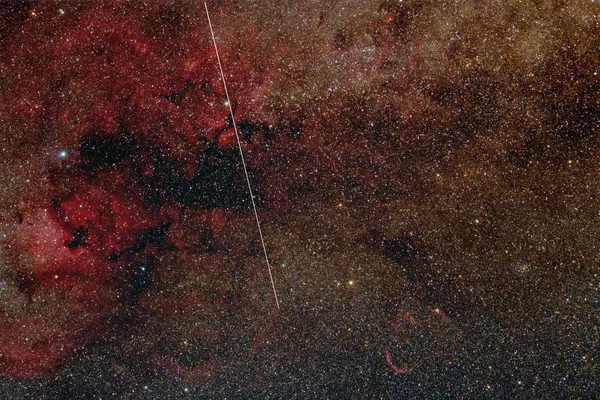 Tiangong es el tercer laboratorio orbital multicomponente del mundo. Las dos primeras son la Estación Espacial Internacional (ISS) y la antigua Mir rusa. En la foto: la nave orbital china en la parte central de la constelación del Cisne (Cygnus). Tiangong es el tercer laboratorio orbital multicomponente del mundo. Las dos primeras son la Estación Espacial Internacional (ISS) y la antigua Mir rusa. En la foto: la nave orbital china en la parte central de la constelación del Cisne (Cygnus). - Sputnik Mundo