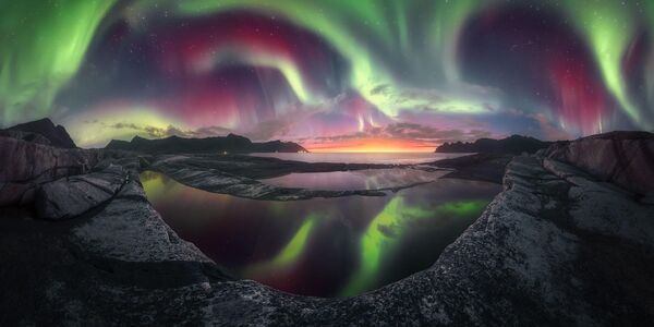 Waning Sun (Sol menguante) del fotógrafo italiano Alex Wides. La imagen fue tomada en la isla de Senja, en Noruega. - Sputnik Mundo