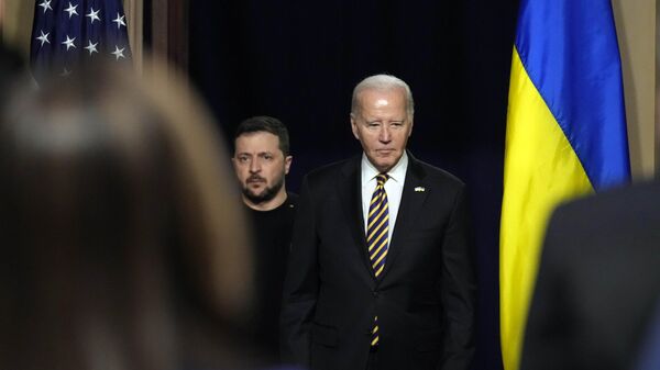 Volodímir Zelenski y Joe Biden  - Sputnik Mundo