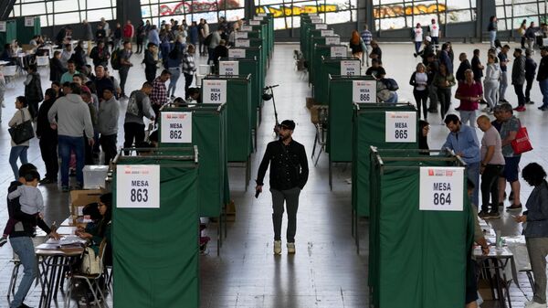 Votación en referendo del proyecto de nueva Constitución en Santiago de Chile - Sputnik Mundo