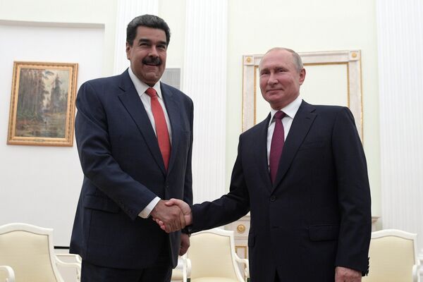 El presidente ruso, Vladímir Putin, y el presidente venezolano, Nicolás Maduro, durante su reunión, el 25 de septiembre de 2019 - Sputnik Mundo