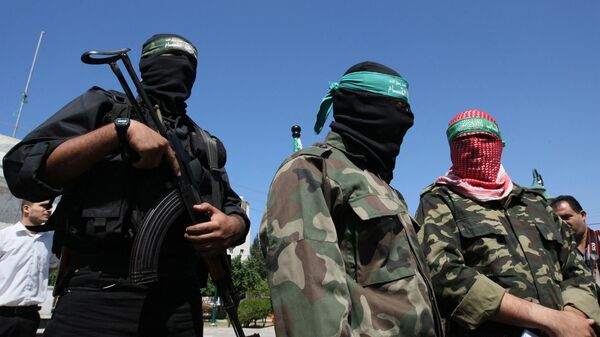 Las Brigadas Qassam (brazo militar del movimiento palestino Hamás) - Sputnik Mundo