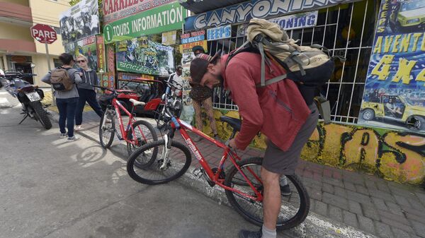 Turistas en Baños, Ecuador - Sputnik Mundo