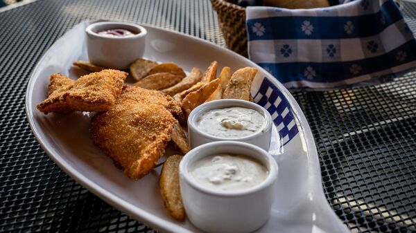 Uno de los platos favoritos de los británicos, el fish and chips - Sputnik Mundo