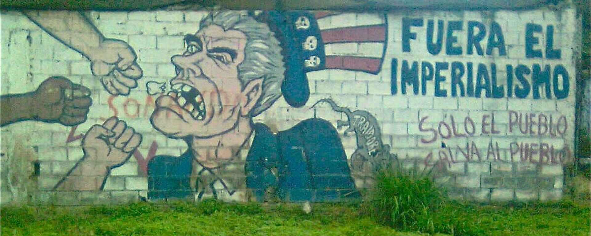 Grafiti en contra del imperialismo estadounidense en una pared en Caracas, Venezuela. - Sputnik Mundo, 1920, 13.08.2024