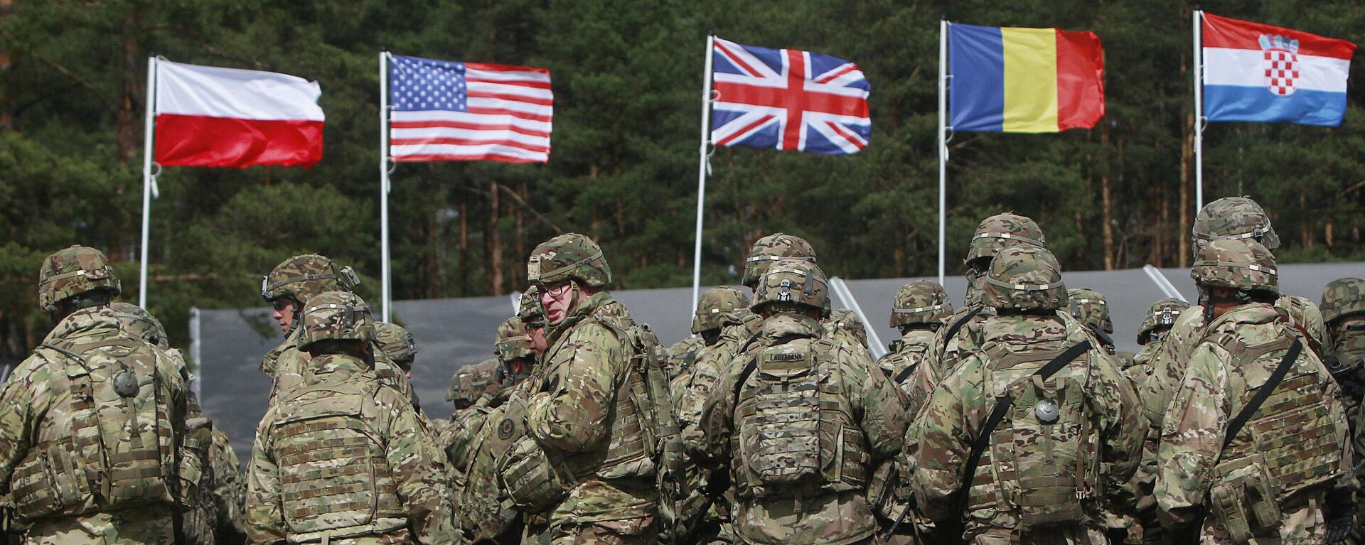 Tropas estadounidenses, parte de una misión de la OTAN para mejorar la defensa polaca, en Orzysz, noreste de Polonia, 13 de abril de 2017 - Sputnik Mundo, 1920, 11.06.2025