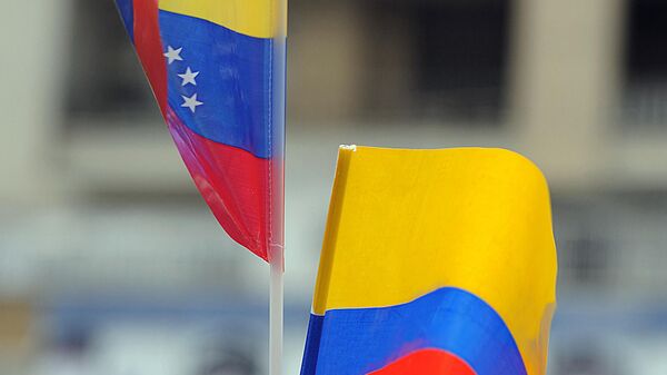 Banderas de Venezuela y Colombia - Sputnik Mundo