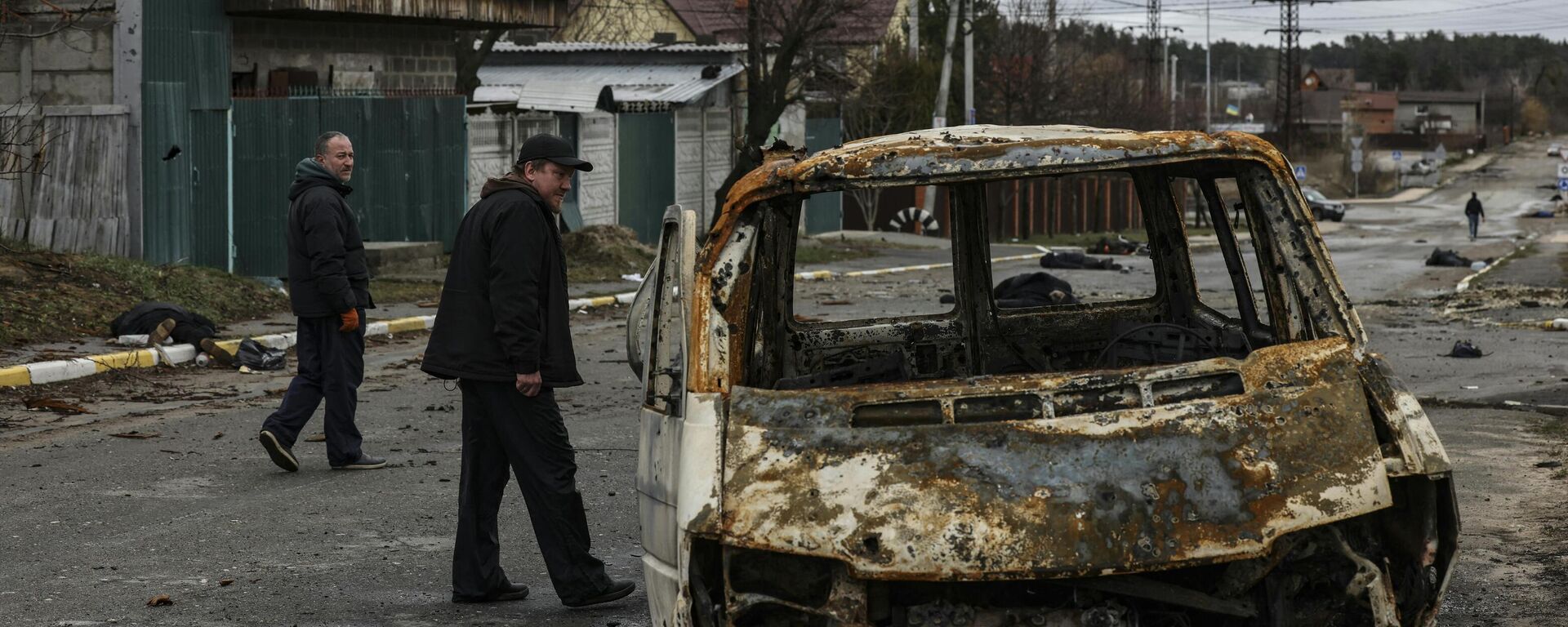 Una calle en la ciudad de Bucha, el 2 de abril, 2022 - Sputnik Mundo, 1920, 03.04.2024