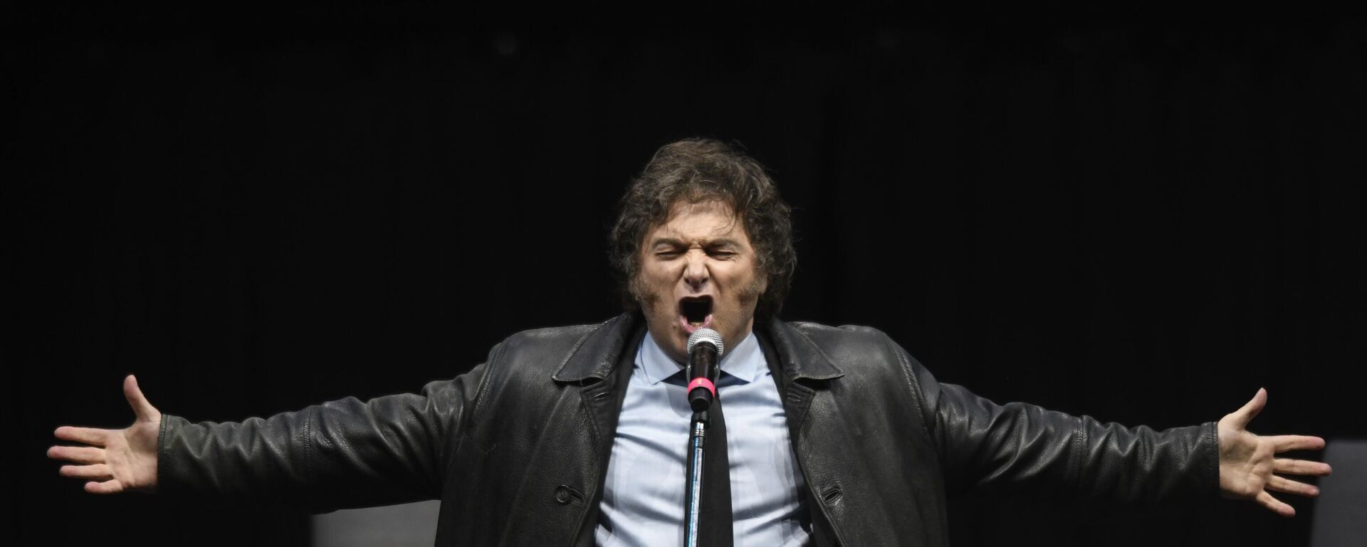 Javier Milei, presidente argentino, cantando en un acto promocional de su nuevo libro en Buenos Aires, Argentina, el 22 de mayo de 2024 - Sputnik Mundo, 1920, 30.12.2024