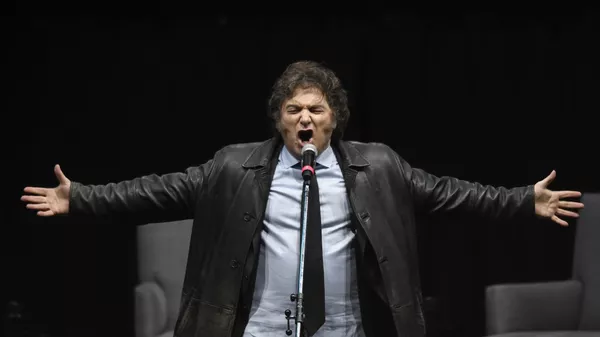 Javier Milei, presidente argentino, canta en un acto promocional de su nuevo libro en Buenos Aires, Argentina, el 22 de mayo de 2024 - Sputnik Mundo