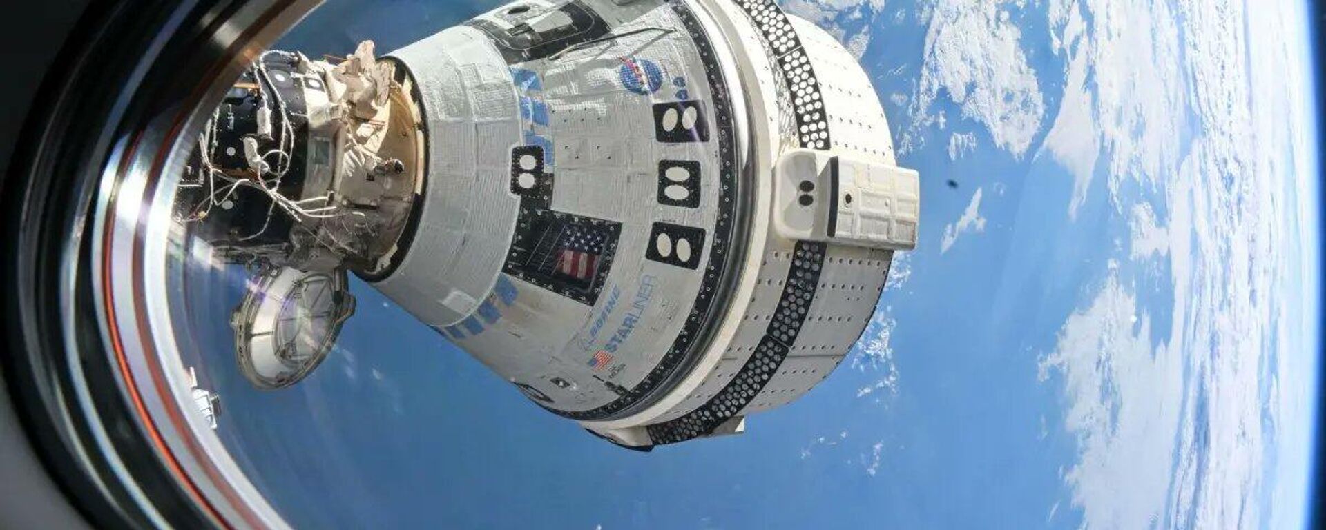 La nave espacial Starliner de Boeing aparece acoplada al puerto delantero del módulo Harmony en la Estación Espacial Internacional.  - Sputnik Mundo, 1920, 03.09.2024