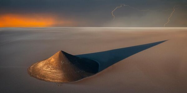 Nominación: TOP 50 Paisajes Naturales AbiertosAutor: Ignacio Palacios	(España)Obra: Tormenta en Cono de Arita, Argentina - Sputnik Mundo