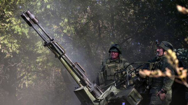 Soldados rusos en la zona de la operación militar especial en Ucrania - Sputnik Mundo