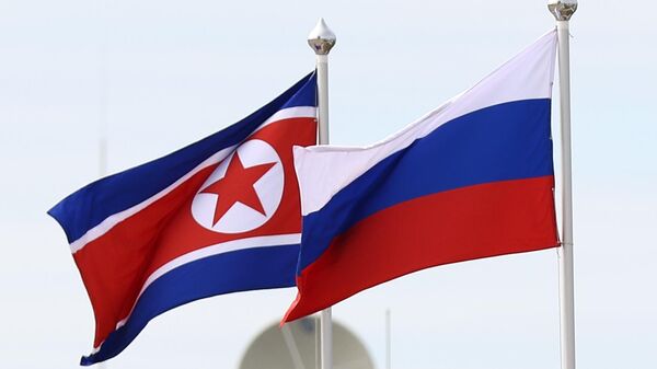 Banderas de Corea del Norte y Rusia - Sputnik Mundo