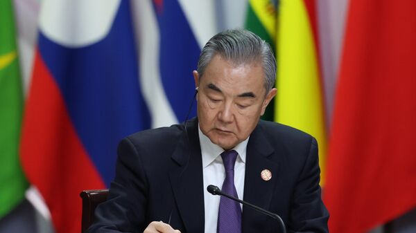 El ministro de Exteriores chino, Wang Yi - Sputnik Mundo