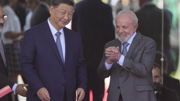 Xi Jinping, presidente chino, y Luiz Inacio Lula da Silva, presidente brasileño - Sputnik Mundo