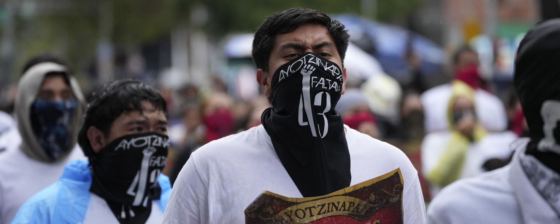 La desaparición de los 43 estudiantes normalistas de Ayotzinapa es un pendiente para el Gobierno de México. - Sputnik Mundo, 1920, 05.12.2024