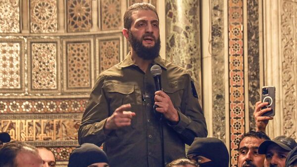 Abu Mohammad al-Julani, jefe del grupo Hayat Tahrir al-Sham (HTS, antiguo Frente Al Nusra, organización prohibida en Rusia por terrorista).  - Sputnik Mundo