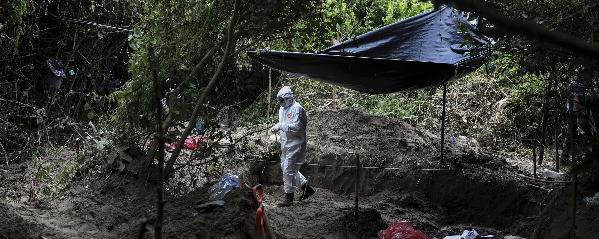 Una fosa común en México - Sputnik Mundo, 1920, 29.12.2024