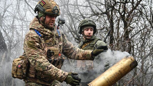 Soldados rusos en la zona de la operación militar especial en Ucrania - Sputnik Mundo